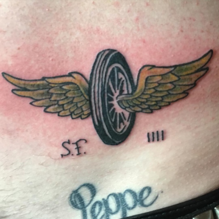 Detail Winged Motorcycle Wheel Tattoo Meaning Nomer 34