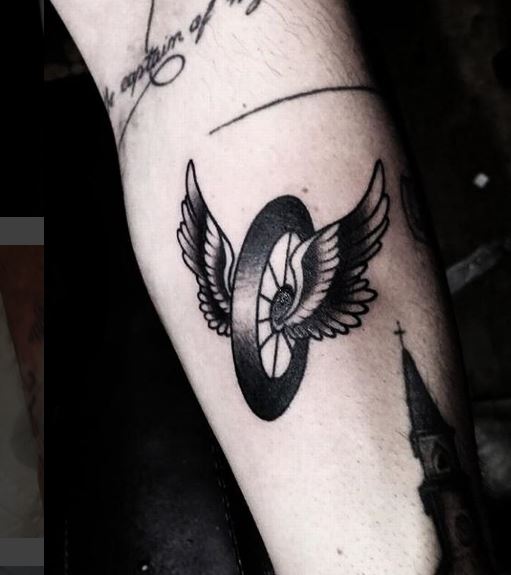 Detail Winged Motorcycle Wheel Tattoo Meaning Nomer 47