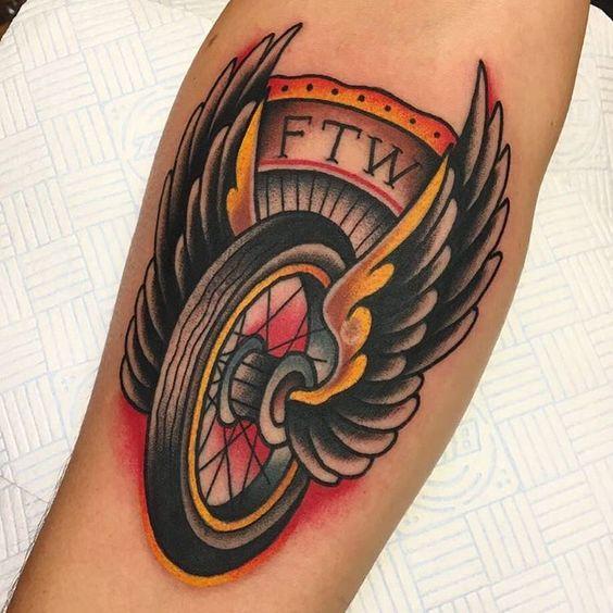 Detail Winged Motorcycle Wheel Tattoo Meaning Nomer 49