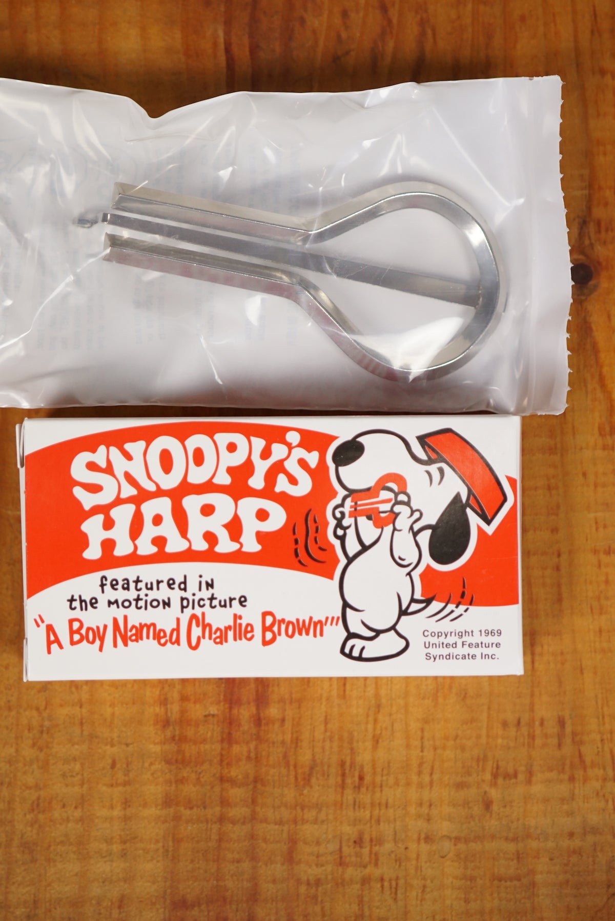 Detail Snoopy Mouth Harp Nomer 31