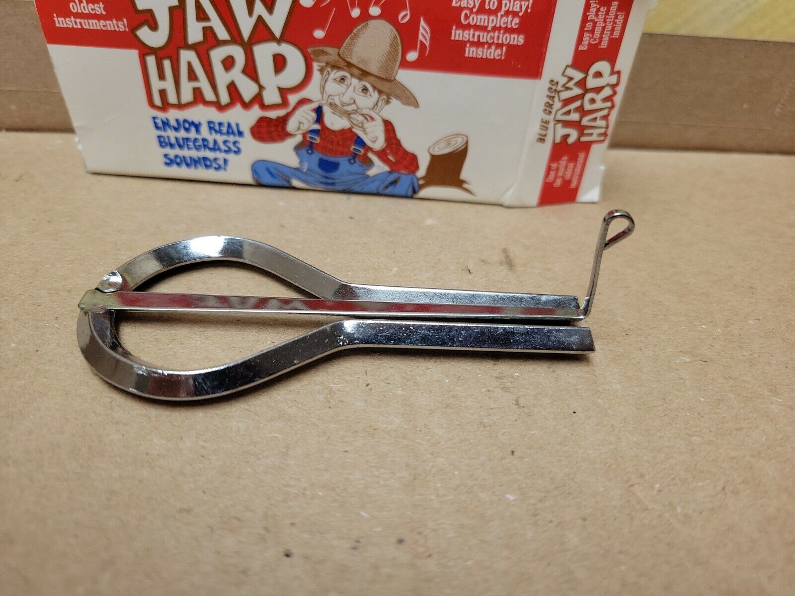 Detail Snoopy Mouth Harp Nomer 40