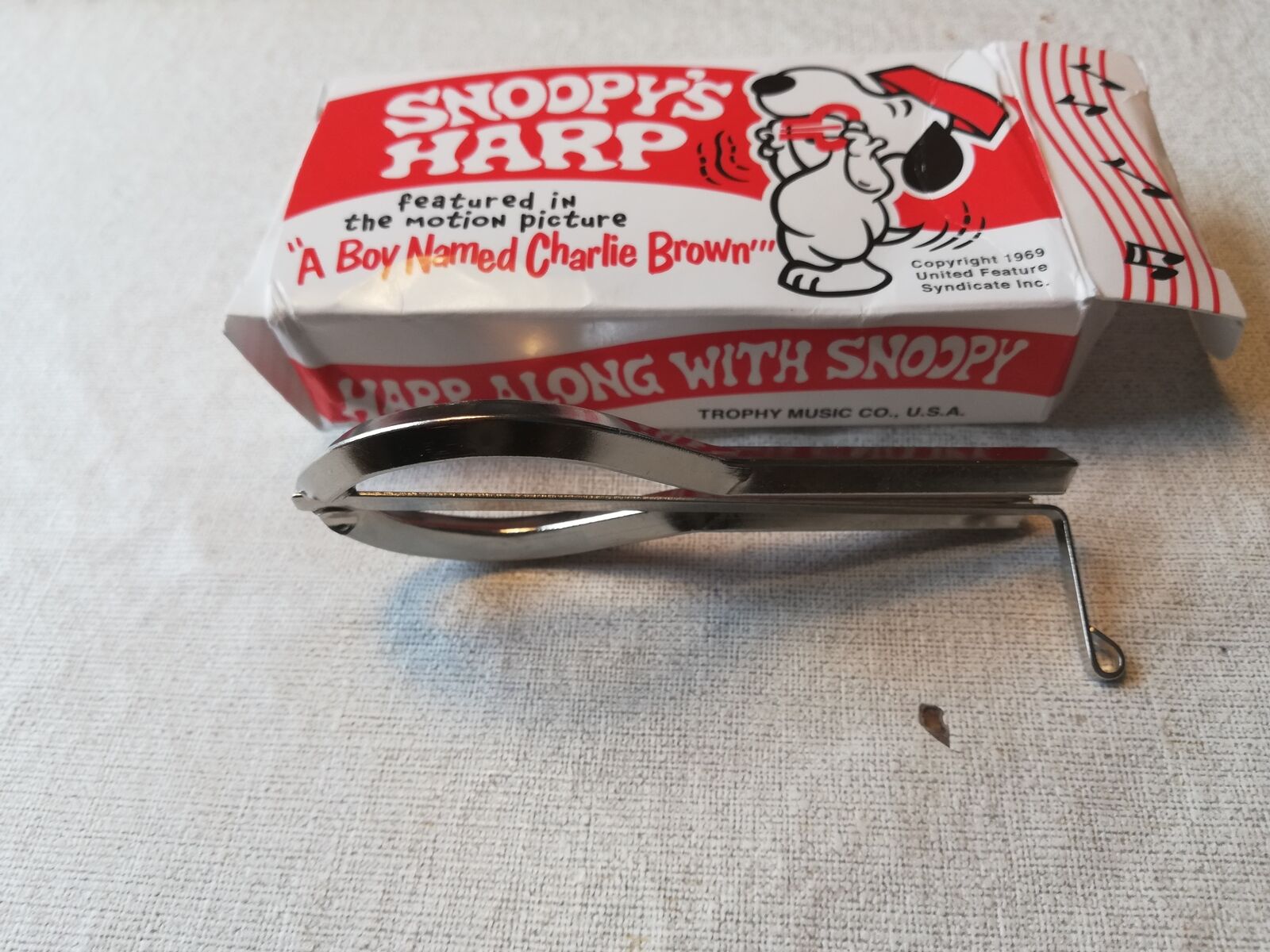 Detail Snoopy Mouth Harp Nomer 44