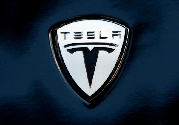 Detail Tesla Logo On Car Nomer 42