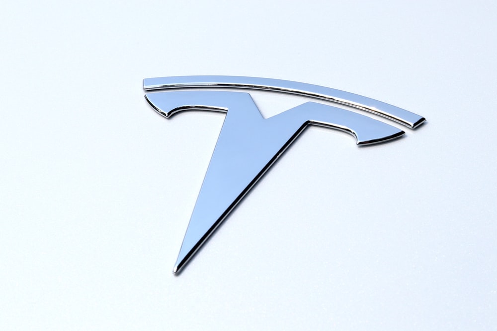 Detail Tesla Logo On Car Nomer 43