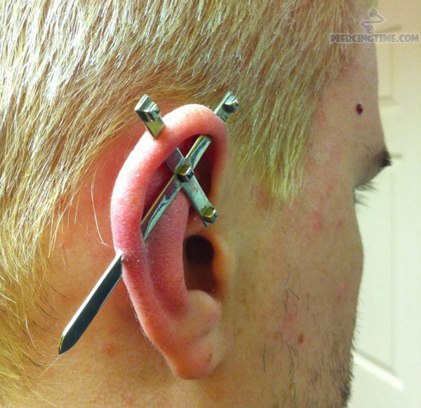 Detail Trident Ear Piercing Nomer 28