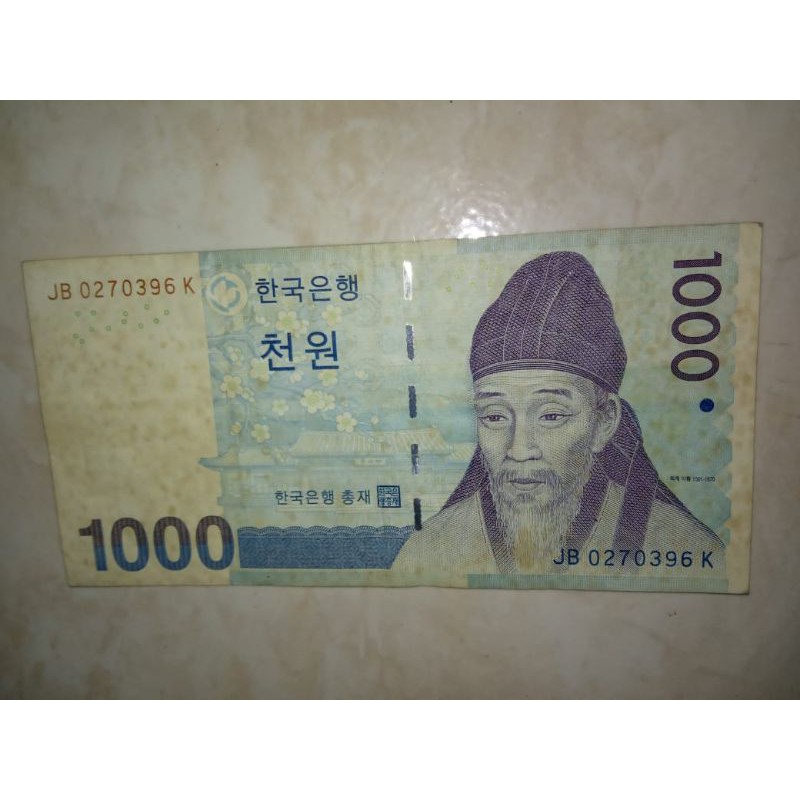 Detail Uang 1000 Won Nomer 7