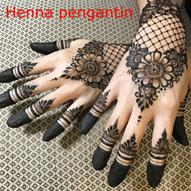 Detail Ukiran Henna Di Tangan Nomer 9