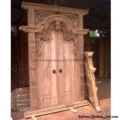 Detail Ukiran Pintu Rumah Nomer 34