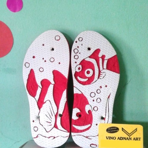 Detail Ukiran Sandal Jepit Nomer 16